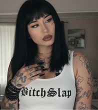 Load image into Gallery viewer, Person wearing a white tank top with 'Bitch Slap' text, surrounded by tattoos and accessories.
