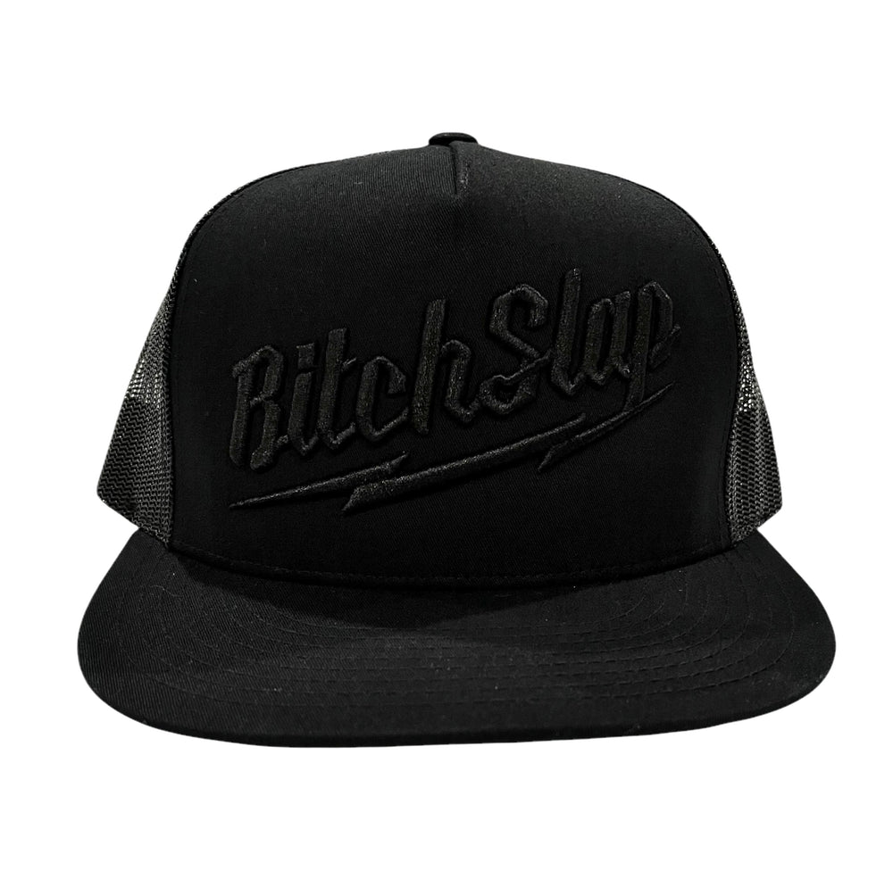 A black flat brim snapback trucker hat with 3D embroidery of 'BitchSlap' Big Bolt on the front.